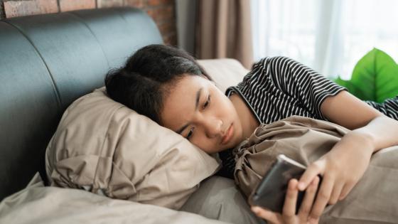 Teenage girl using mobile phone
