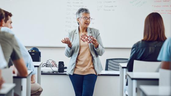 university professor in science class